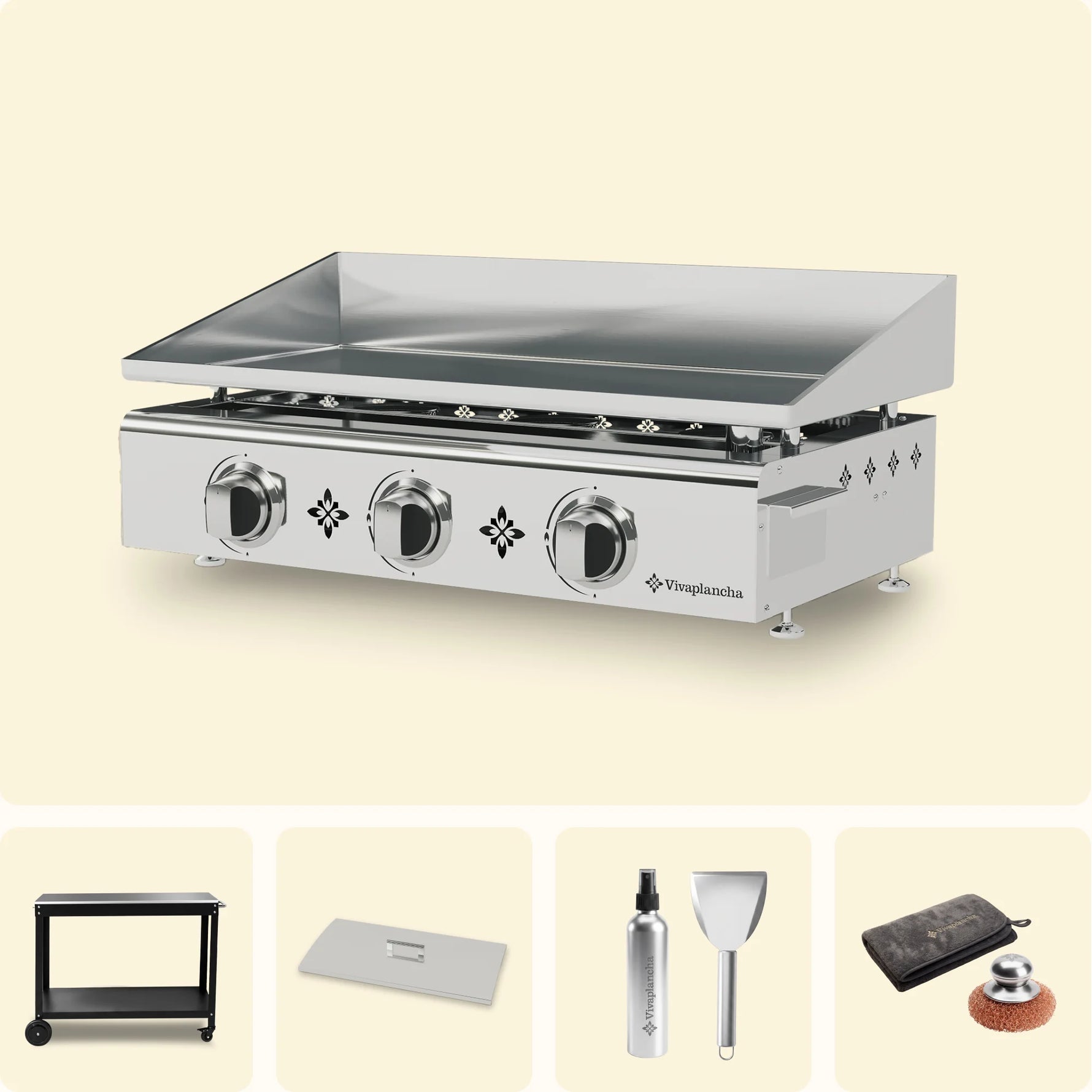 Plancha gaz Pimientos 3 feux Vivaplancha en inox avec rebords releveurs et boutons de réglage, accompagnée de ses accessoires : desserte, couvercle de protection, spray nettoyant avec spatule, et housse de protection avec galet de nettoyage.
::visuel:sansportes